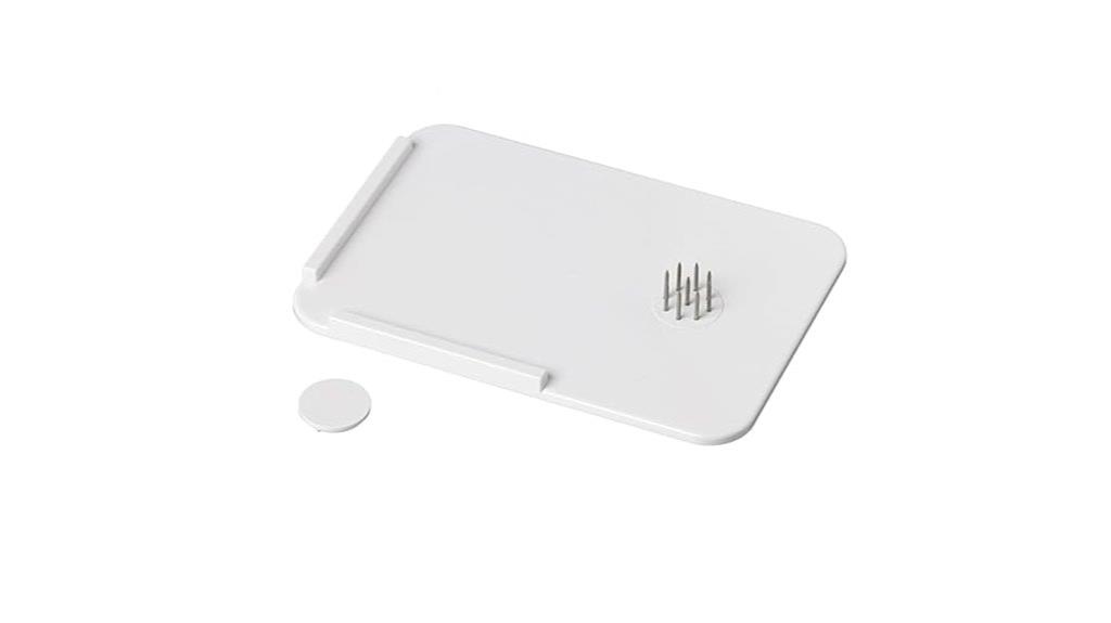 plastic spreader with spikes